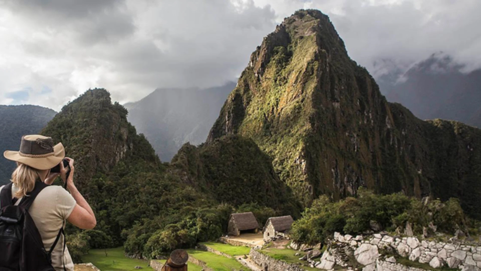 Machu Picchu with clouds and sun