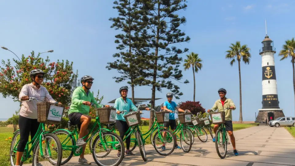 Happy tourists taking a bike tour through Miraflores and Barranco