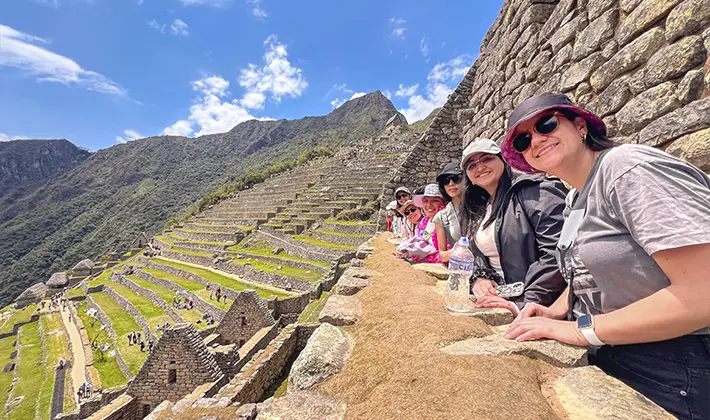 Machu Picchu tour in the citadel with Uros Expeditions, exploring Inca temples, terraces, and architecture during the guided visit