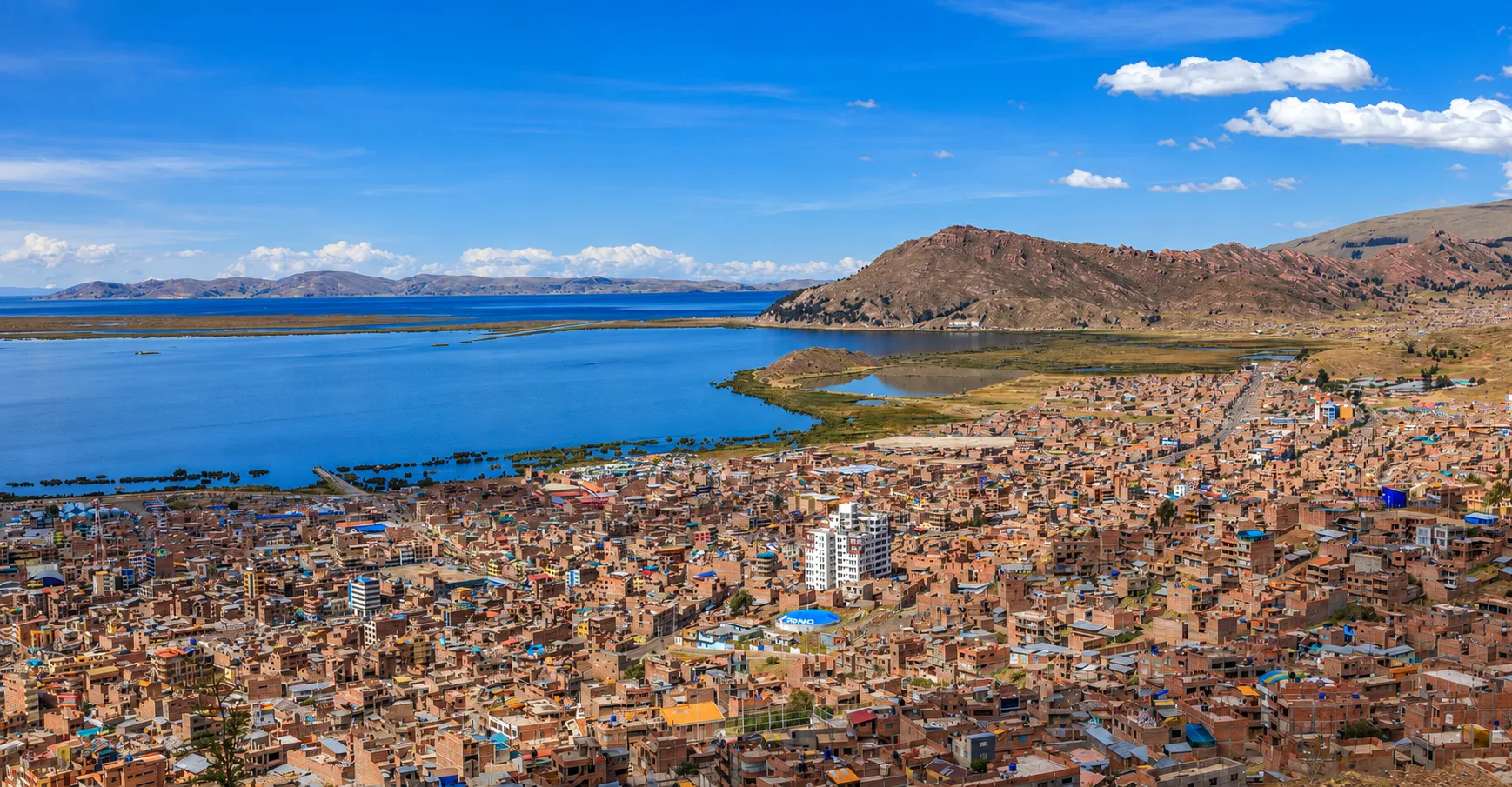 Panoramic view of Puno city and Lake Titicaca