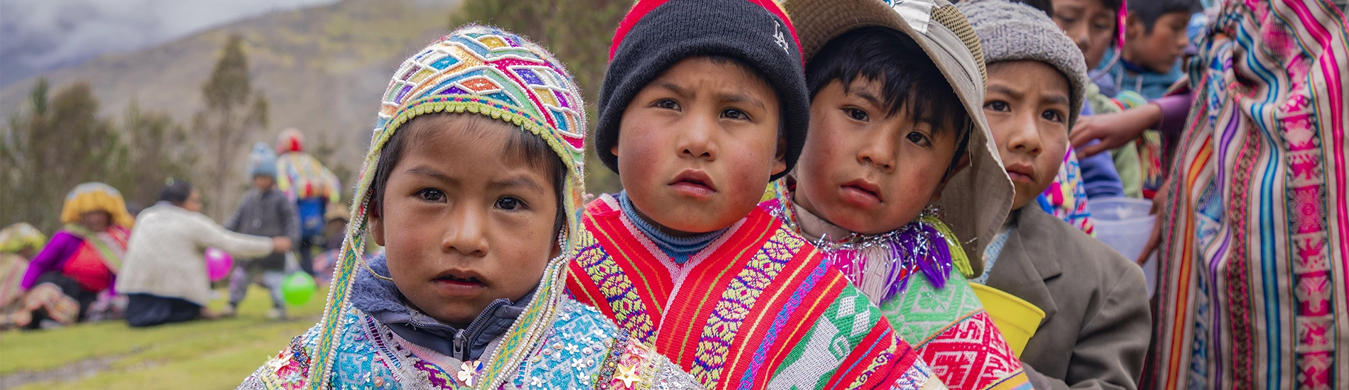 Community outreach initiative in Lares Valley, Peru, supporting local Andean families through responsible tourism.