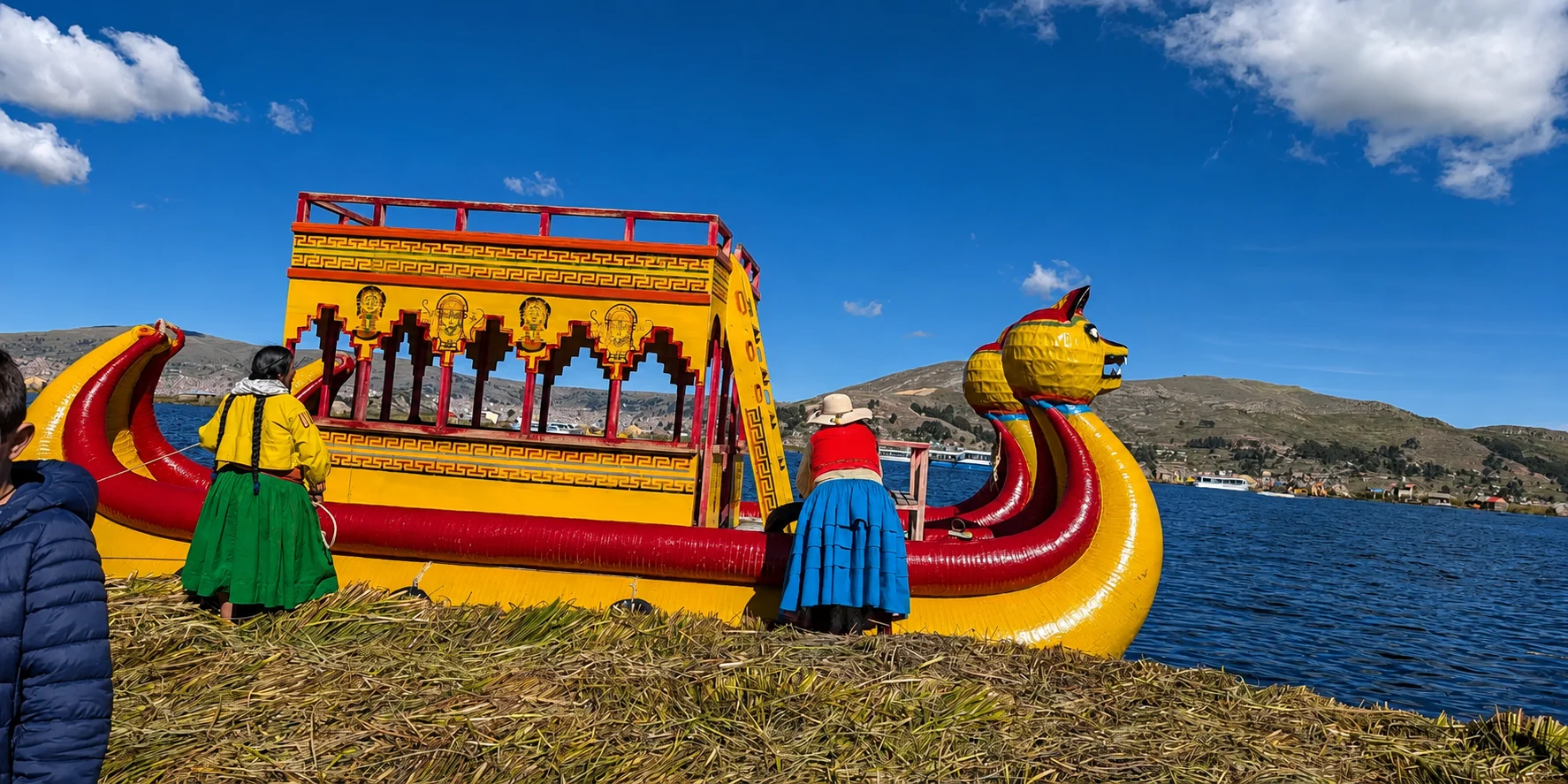 Tour boat traveling from Puno to the Uros Islands